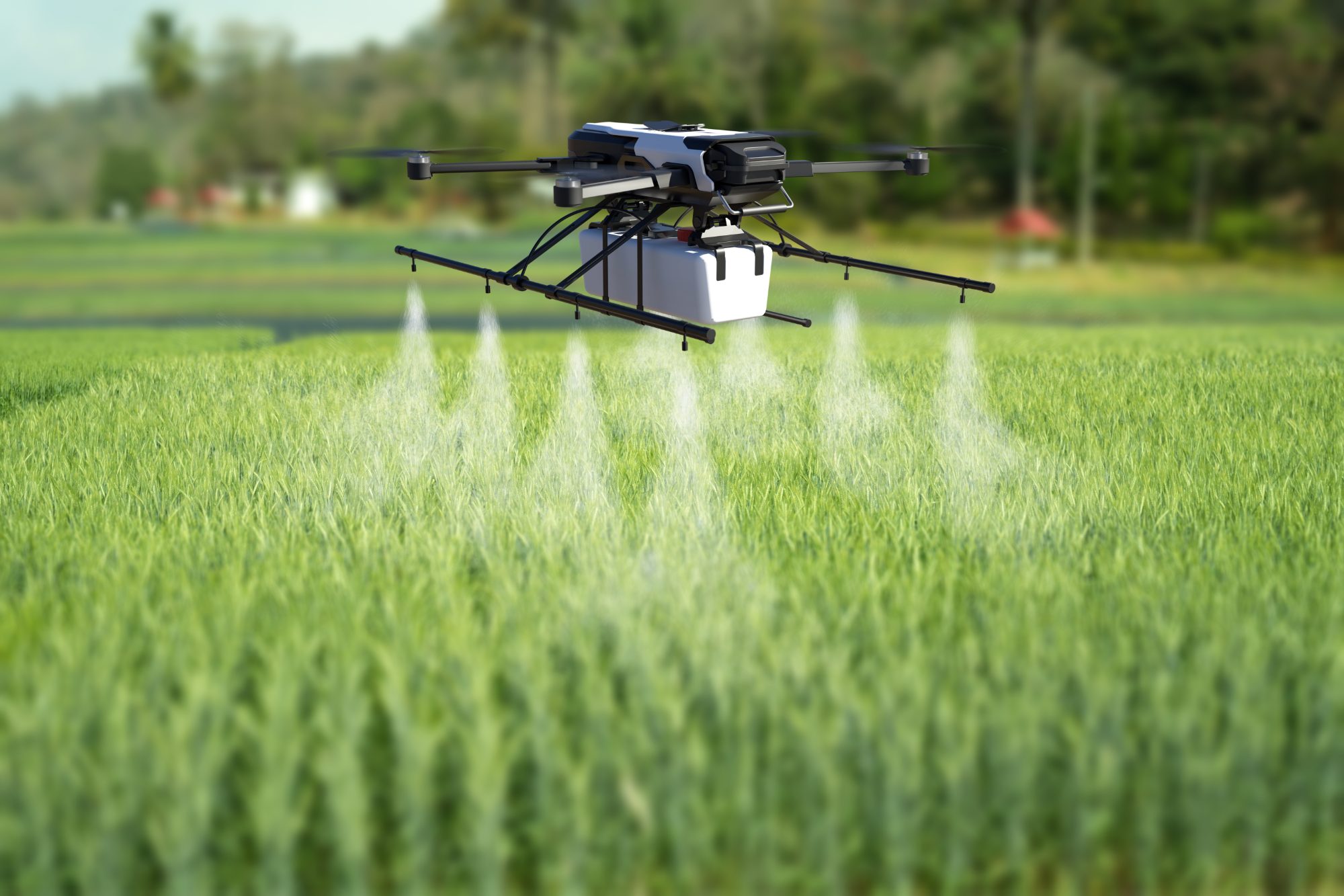 Agricultural drone spraying a field of crops
